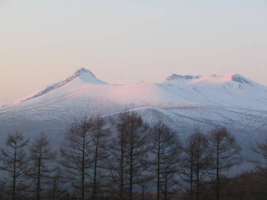 夕日に染まる函館駒ケ岳の写真